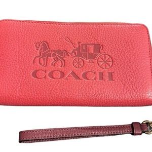Coach pink long zip around wallet with embossed horse and carriage
